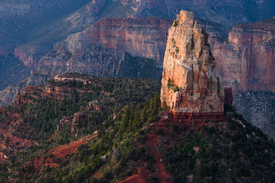 Sunrise looking into the Grand Canyon at the pinnacle rock formation of Mt. Haden at Point Imperial on the north rim, Kaibab National Forest, Grand Canyon National Park, Arizona, USA
