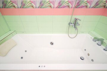 White whirlpool bath in the bathroom
