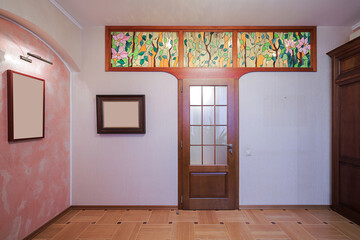 Classic interior door with stained glass windows in the room