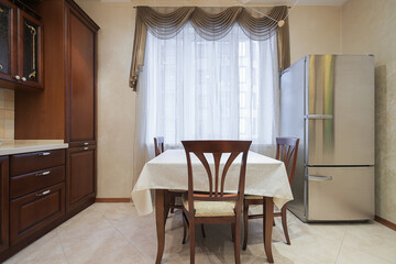 Dining table in the kitchen interior