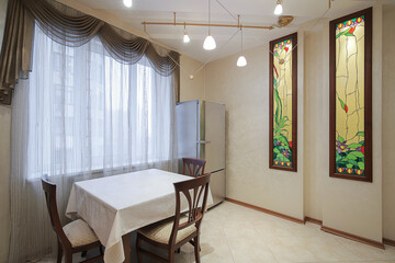 Dining table in the kitchen interior