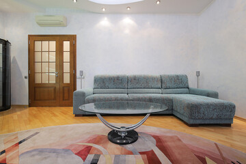 Sofa and table in the living room interior