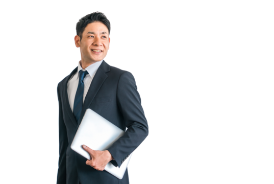パソコン・ノートパソコンを持つスーツ姿の中年アジア人ビジネスマン
