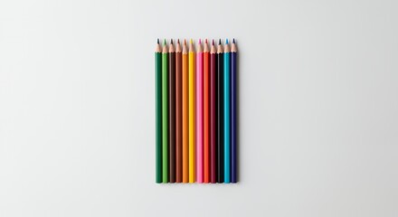A vibrant collection of colored pencils arranged neatly against a clean white background, showcasing their diverse hues and sharp points.