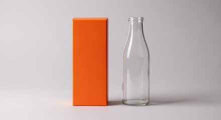 A tall, clear glass bottle stands beside a vibrant orange rectangular box on a minimalist white background, creating a clean and modern product display.