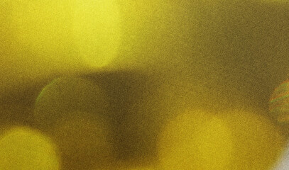 Soft yellow light creates a warm, inviting glow, with abstract bokeh effects and a blurred...