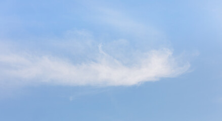 Thin Cirrus Cloud Stretching Across a Clear Blue Sky