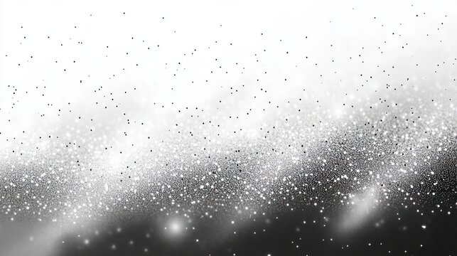 Abstract gradient of scattered black and white dots creating a sparkling, cosmic-like or particle explosion effect on a light to dark background