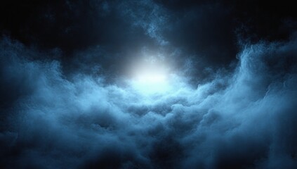 Fototapeta premium mysterious glowing light surrounded by dense thick blue clouds in a dark sky creating a dramatic and ethereal atmosphere