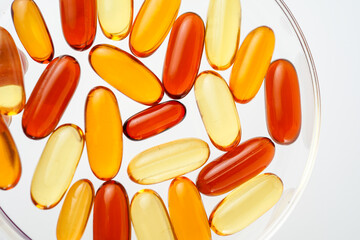 Vitamins capsules, fish oil, soft gels, supplements, omega 3, omega 9, vitamin D, vitamin E