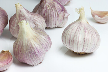Garlic Bulbs and Cloves on white background