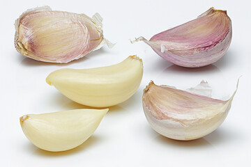 Garlic Bulbs and Cloves on white background