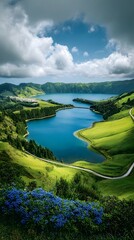 A view of a tranquil lake surrounded by green mountains and hills.