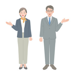 案内をする中年ビジネスマンの男女