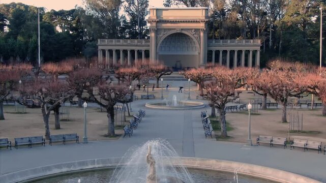 Golden Gate Park's Music Concourse in San Francisco, USA. Shows the park's layout, fountains, trees, and the Spreckels Temple of Music.