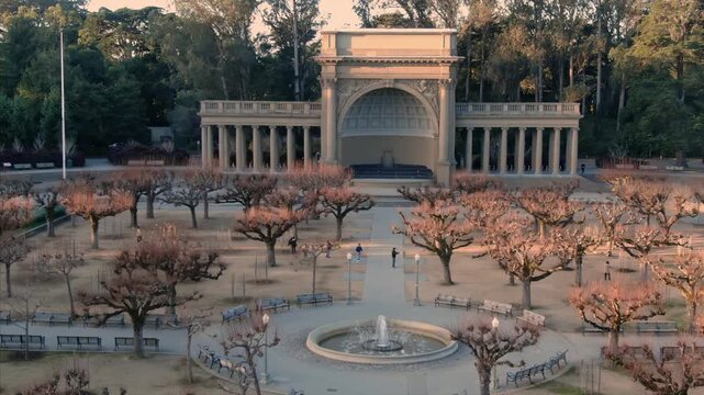 Golden Gate Park's Music Concourse in San Francisco, USA. Shows the park's layout, fountains, trees, and the Spreckels Temple of Music.