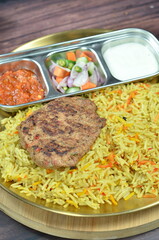 Nasi Kebuli, Indonesian variation of pilaf with Arabic rice influence, cook with goat, lamb or chicken, Spiced  with Clove, Cinnamon and garlic.