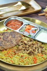 Nasi Kebuli, Indonesian variation of pilaf with Arabic rice influence, cook with goat, lamb or chicken, Spiced  with Clove, Cinnamon and garlic.