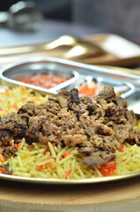 Nasi Kebuli, Indonesian variation of pilaf with Arabic rice influence, cook with goat, lamb or chicken, Spiced  with Clove, Cinnamon and garlic.