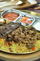 Nasi Kebuli, Indonesian variation of pilaf with Arabic rice influence, cook with goat, lamb or chicken, Spiced  with Clove, Cinnamon and garlic.