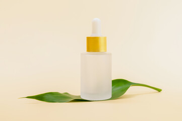 Cosmetic bottles packaging for mockup on a beige background. The concept of natural beauty products.
