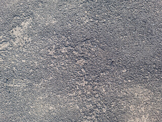 This is a close-up of an asphalt road.