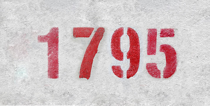 number 1795 . Red spray paint the white wall