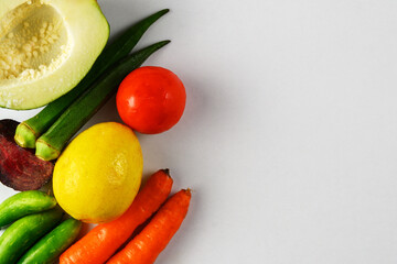 Selection of Fresh and Colorful Vegetables on a Minimalist Background