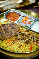 Nasi Kebuli, Indonesian variation of pilaf with Arabic rice influence, cook with goat, lamb or chicken, Spiced  with Clove, Cinnamon and garlic.