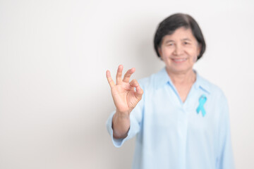 Elderly with blue Ribbon for Prostate Cancer Awareness month, April Child Abuse Prevention, National Bullying, September Addiction Recovery, May Chronic Fatigue Syndrome and January Human Trafficking