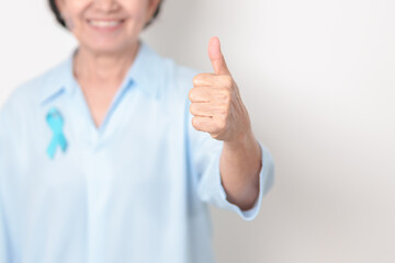 Elderly with blue Ribbon for Prostate Cancer Awareness month, April Child Abuse Prevention, National Bullying, September Addiction Recovery, May Chronic Fatigue Syndrome and January Human Trafficking