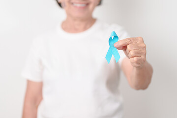 Elderly with blue Ribbon for Prostate Cancer Awareness month, April Child Abuse Prevention, National Bullying, September Addiction Recovery, May Chronic Fatigue Syndrome and January Human Trafficking