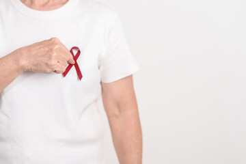 Elderly with Burgundy Ribbon for March Multiple Myeloma Cancer Awareness month, September Sickle Cell Anemia, Headache and Migraine week, April world Meningitis day, October Hospice  Palliative care
