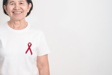 Elderly with Burgundy Ribbon for March Multiple Myeloma Cancer Awareness month, September Sickle Cell Anemia, Headache and Migraine week, April world Meningitis day, October Hospice  Palliative care