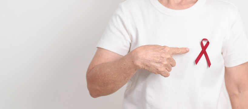 Elderly with Burgundy Ribbon for March Multiple Myeloma Cancer Awareness month, September Sickle Cell Anemia, Headache and Migraine week, April world Meningitis day, October Hospice  Palliative care - Powered by Adobe