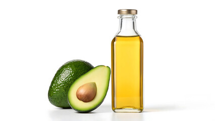 Fresh avocado and golden oil in a tall glass bottle