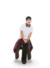 A young skater leans playfully while holding his skateboard. A sporty young man has headphones...