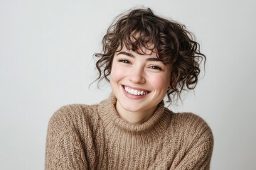 Radiant Smile: Captivating portrait of a young woman with curly hair, her genuine smile radiates warmth and positive energy.