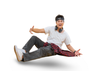 A young man in mid-air dance pose, wearing casual outfit and headphones on png background