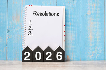2026 Happy New Year with RESOLUTION word and wooden number. time for a New Start, goal, Plan, Action and Mission Concept © Jo Panuwat D