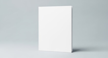 Fototapeta premium Blank White Book Cover Standing Upright on Light Gray Background