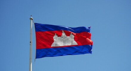 Cambodian national flag. Cambodian flag waving proudly against the sky, a patriotic symbol of the nation