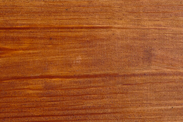 Beautiful close-up of polished wooden surface showcasing natural grain and texture under soft...