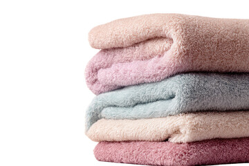 Stack of soft, folded towels in pastel shades