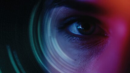 Image captures close up of eye surrounded by vibrant swirling colors, evoking sense of intrigue and depth. In privacy 5G era, importance