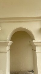 Fototapeta premium Colonnade with stone columns and arches in the historic city of London