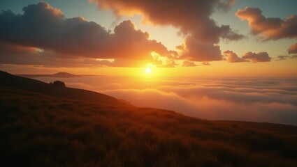 Stunning sunset view over a high altitude meadow with clouds.