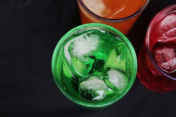 Soft drink with ice in glass