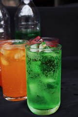 Soft drink with ice in glass