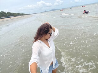 Happy woman at tropical beach